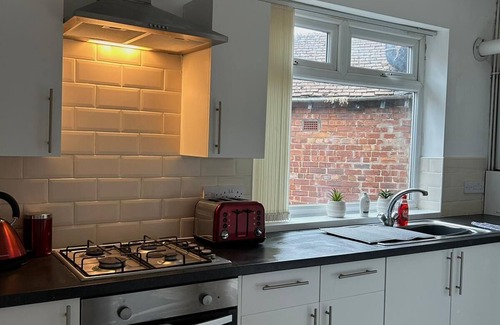 Huyton Apartamento | Apartamento-Apartamento-Baño privado-Vista a la Calle