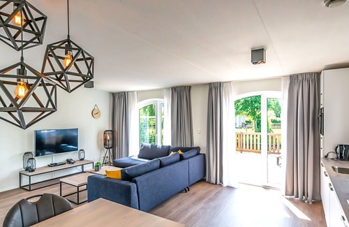 Municipality of Hellevoetsluis Casa | Bonito apartamento en villa para 4 personas con WIFI, piscina, TV y aparcamiento