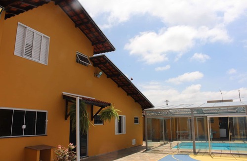 Regiao Urbana Homogenea XXIII Casa | Casa de campo con piscina climatizada en Poços de Caldas