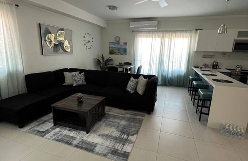 New Kingston Apartamento | Cozy apartment in new Kingston w/rooftop pool, super close to A/C Marriott.