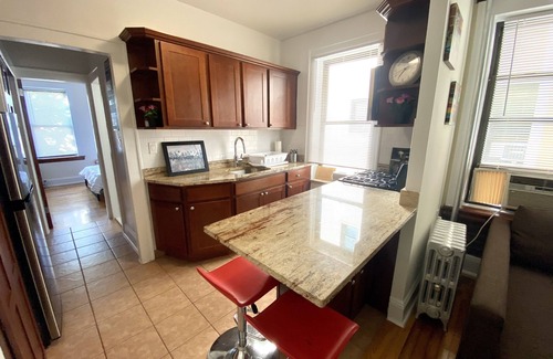 Ditmars Steinway Casa | Cozy Brick Apartment Near Everything!