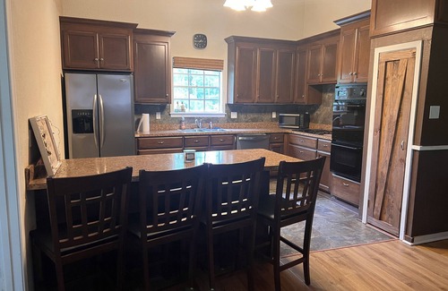 Fluker Cabina | Cozy Camp w/ fire pit, grill and waterfront view of river. Pet Friendly!