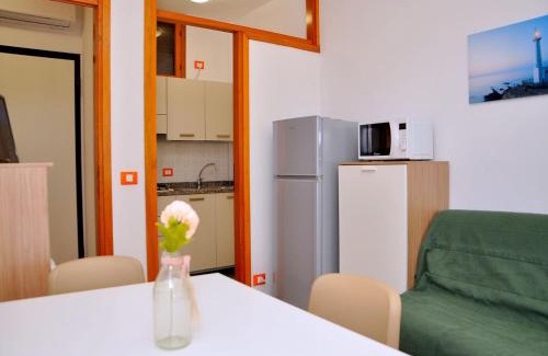 Bibione Pineda Apartamento | Cozy flat with sunlit balcony retreat - Beahost