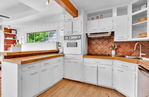 Loring Heights Casa | Cozy Midtown retreat with skyline views, private yard, deck, firepit, & W/D
