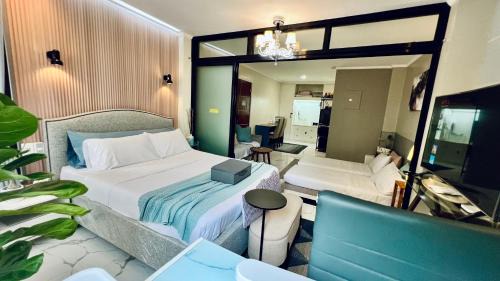 Angono Casa | Cozy Nest Fully-furnished apartment with Manila Skyline View Rooftop