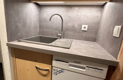 Sankt Martin bei Lofer Apartamento | Cozy new vacation apartment with mountain views, garden and swimming pool