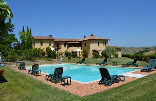 Asciano Apartamento | Acogedora escapada a la campiña toscana