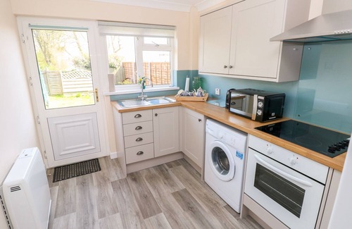 Hundleton Apartamento | CASA CRANFORD, admite mascotas, con un jardín en Pembroke, Ref 998100