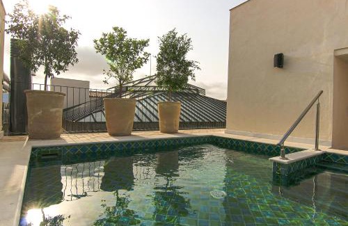 Encarnacion-Regina Hotel | Cristine Bedfor Sevilla Boutique Hotel