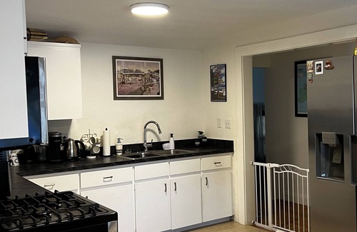 Edgewater Casa | Cute, comfortable home with a sunny front porch. 3 minute walk to the river.