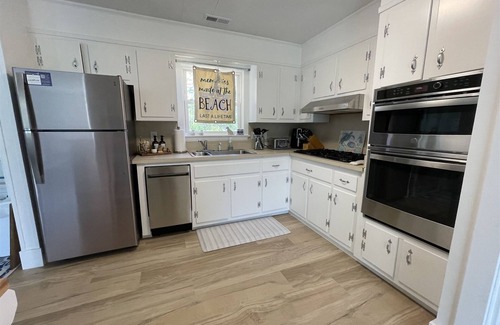 Buxton Cabaña | Cypress Cove, situated in Buxton on a soundfront lot, provides a peaceful setting in this charming rental cottage.