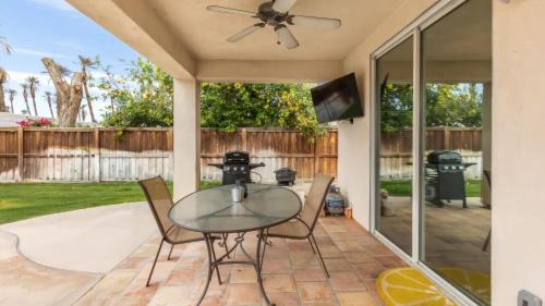 Coachella Casa | Desert Oasis w Pool Spa BBQ Outdoor Dining Under the Palms Calle Tolosa by AvantStay