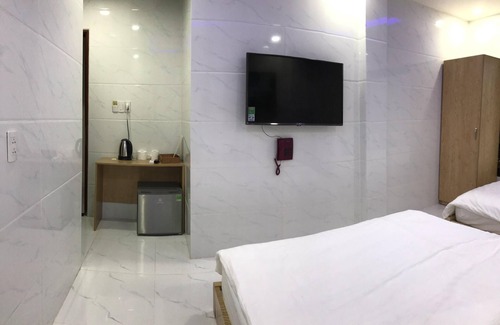 Ben Thanh Hotel | Deluxe privado 2 camas 1 baño 4 huéspedes en el hotel tu y yo