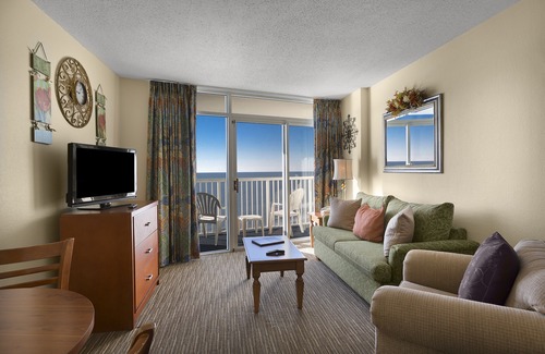Arcadian Shores Complejo | Suite directamente frente al mar en Family Resort + Privilegios de alquiler en el sitio oficiales