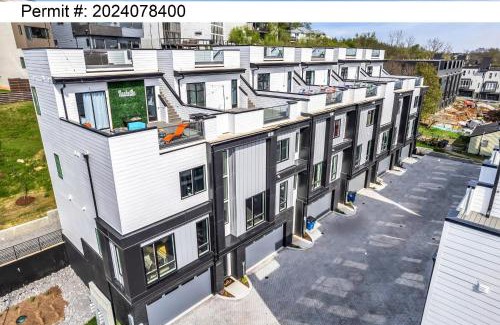 Katie Hill Neighborhood Casa | Disco Themed Hot Tub & Rooftop Decks in Nashville