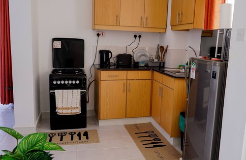Riruta Apartamento | Divine Stays w/ WIFI, Netflix, Swimming Pool, Gym, Parking, Lift
