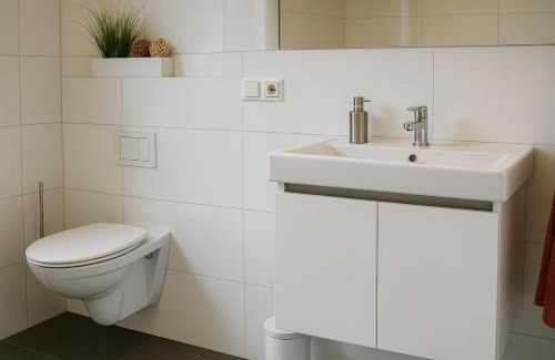 Nordhorn Casa | Dock 61 - tolles Ferienhaus für bis zu 4 Personen mit Kaminofen und Sauna - Haustiere herzlich willkommen, direkt am Wasser gelegen