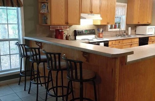 Hawkins Casa | Dock Holiday is a lakefront home with hot tub. Bring your fishing pole.