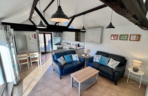 Dilham Casa | Dog and family friendly barn conversion with fully enclosed garden and hot tub