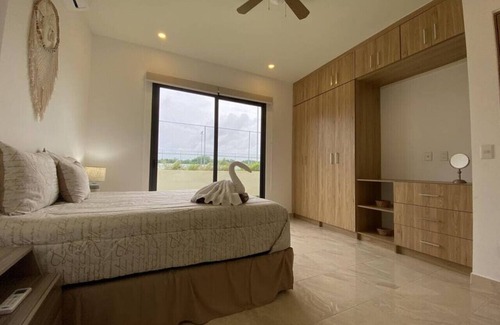 Ejidal Apartamento | Dog friendly 2BR w/backyard, pool, gym, bbq, pking