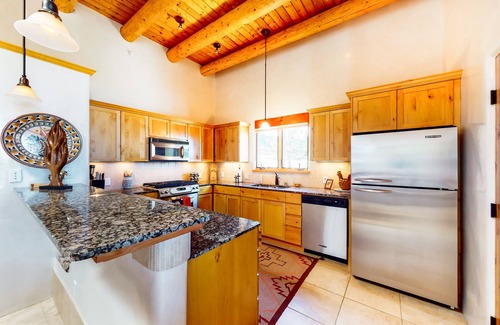 Tesuque Condominio | Dog-friendly condo with kiva fireplaces, enclosed yard, & pool access