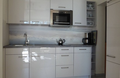 Wangerooge Apartamento | "Domicilio en el faro", terraza sur m. Silla de playa central