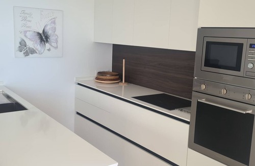 Nueva Milla de Oro Apartamento | Dominion Beach Aplicación de planta baja. con jardín 6 personas directamente junto al mar y piscina