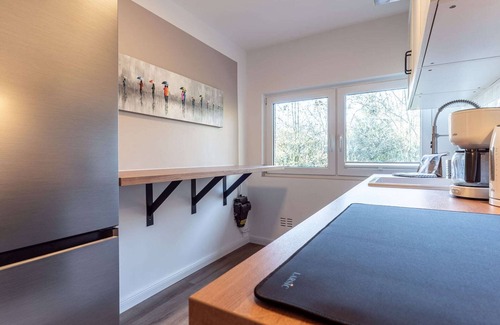 Hauert Casa | Doble sala de estar en Tating