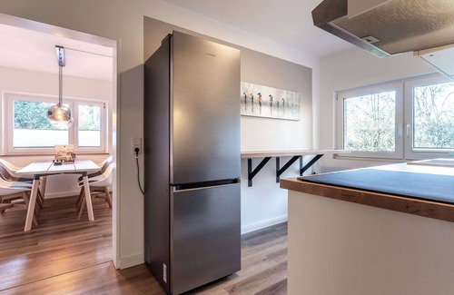 Hauert Casa | Doble sala de estar en Tating
