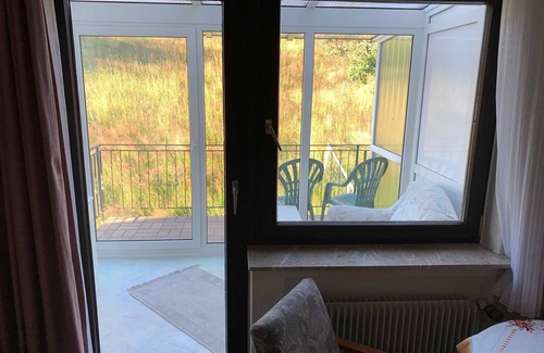 Reichelsheim Cabaña | Doppelzimmer mit Wintergarten - 31 - Gasthaus und Pension Zum Fürstengrund