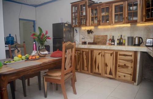 Fairy Hill Casa | Downstairs Bedroom at Robin Hood guesthouse