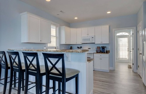 Surf City Casa | Magníficamente remodelado frente al mar privado con jacuzzi para 12 personas