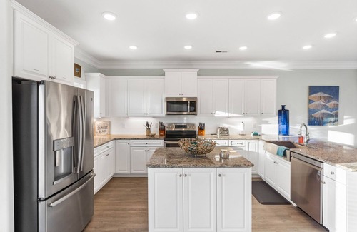 Sunset Beach Casa | Easy Breezy is a stunning 4 bedroom, 4 bathroom house with a private pool and elevator