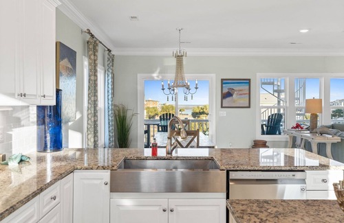 Sunset Beach Casa | Easy Breezy is a stunning 4 bedroom, 4 bathroom house with a private pool and elevator