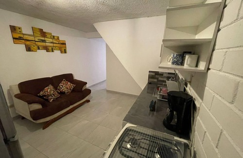 Santo Domingo de los Colorados Apartamento | Suite cómoda en Santo Domingo. Fácil llegada desde la terminal terrestre.