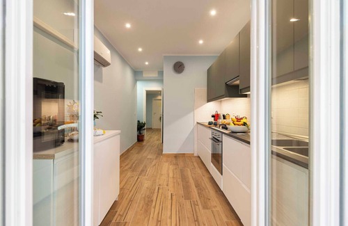 Quartiere XXXIII Lido di Ostia Ponente Apartamento | Elegance and Comfort: Spacious House with Patio and 3 Bathrooms