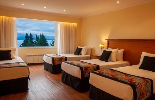 San Carlos de Bariloche Hotel | Elegant Nahuel Huapi Retreat – Spacious Room w/ Lake and Garden Views Nearby