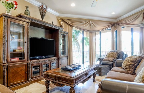 St. Tropez Casa | Elegant coastal villa with spacious patio, pool, hot tub, free WiFi & central AC