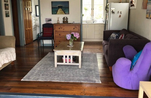 Pataua Casa | Relajante casa frente al mar en la playa: grandes terrazas con excelente flujo interior / exterior