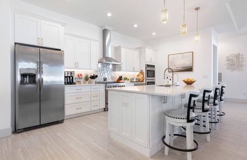 Palm Coast Casa | Enchanting house with heated pool, full kitchen, central AC, & washer/dryer