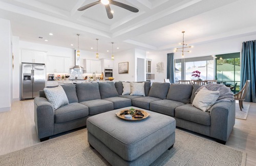 Palm Coast Casa | Enchanting house with heated pool, full kitchen, central AC, & washer/dryer