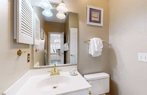 Arcadian Shores Condominio | End-unit condo with covered patio, pool, tennis & washer/dryer - dog-friendly