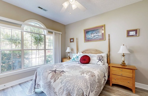 Arcadian Shores Condominio | End-unit condo with covered patio, pool, tennis & washer/dryer - dog-friendly