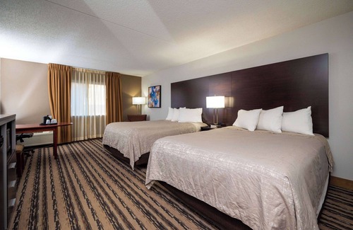 Topeka Hotel | Endeavor Inn & Suites, Trademark Collection by Wyndham