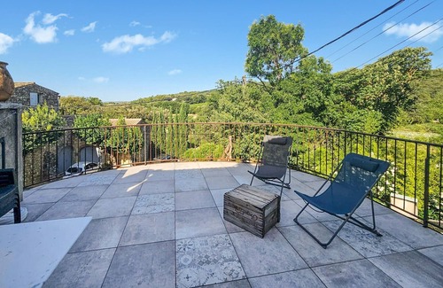 Cornillon Casa | Enjoy a wonderful view of the countryside from the terrace of this vacation home.