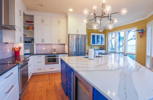 West Beach Casa | Enjoy Stunning Marsh & Tidal Water Views in This Renovated Home w/ Chef's Kitchen & Custom Finishes