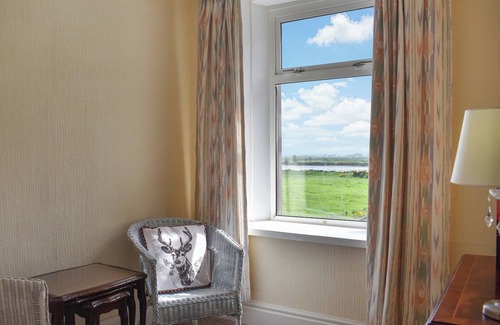 Beckfoot Cabaña | Escape to The Stables, a charming two-bedroom cottage near Silloth, Cumbria.