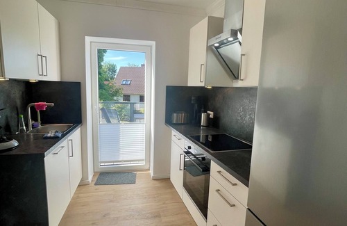 Altefaehr Apartamento | Exclusive apartment with harbor view - 200m to the south beach on the island of Rügen
