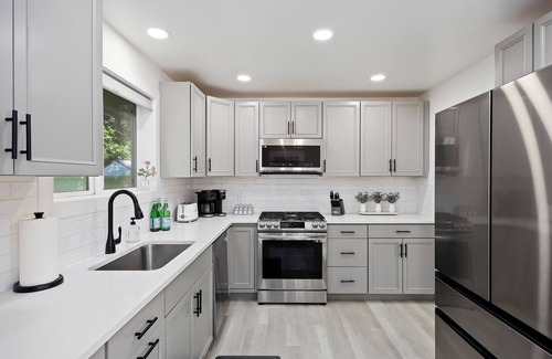 Burley Casa | Experience elevated comfort in this thoughtfully designed retreat. Featuring two inviting bedrooms, a fully equipped kitchen, and serene details, it blends simplicity with style for a clean, welcoming stay.