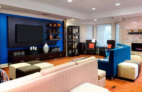 North Myrtle Beach Hotel | Explore Barefoot Landing then Relax in Indoor Pool Retreat | 4 Rooms